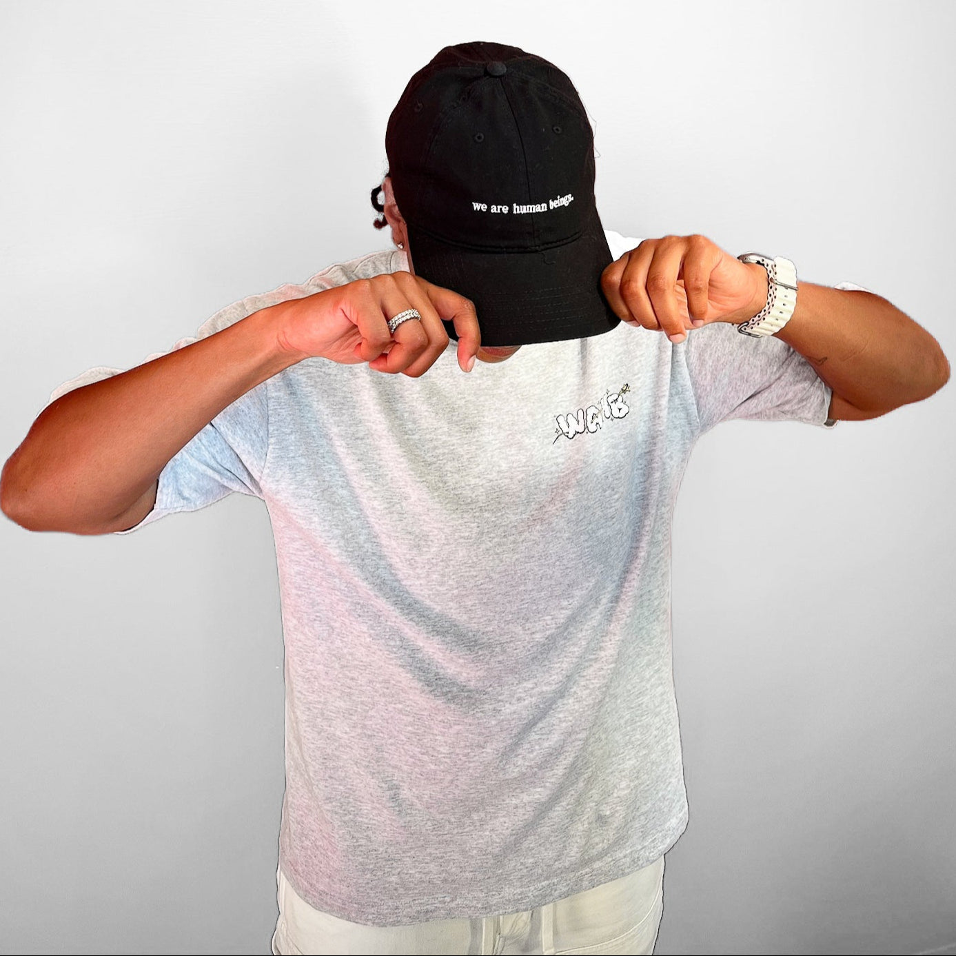 typewriter "we are human beings" hats (now available!)