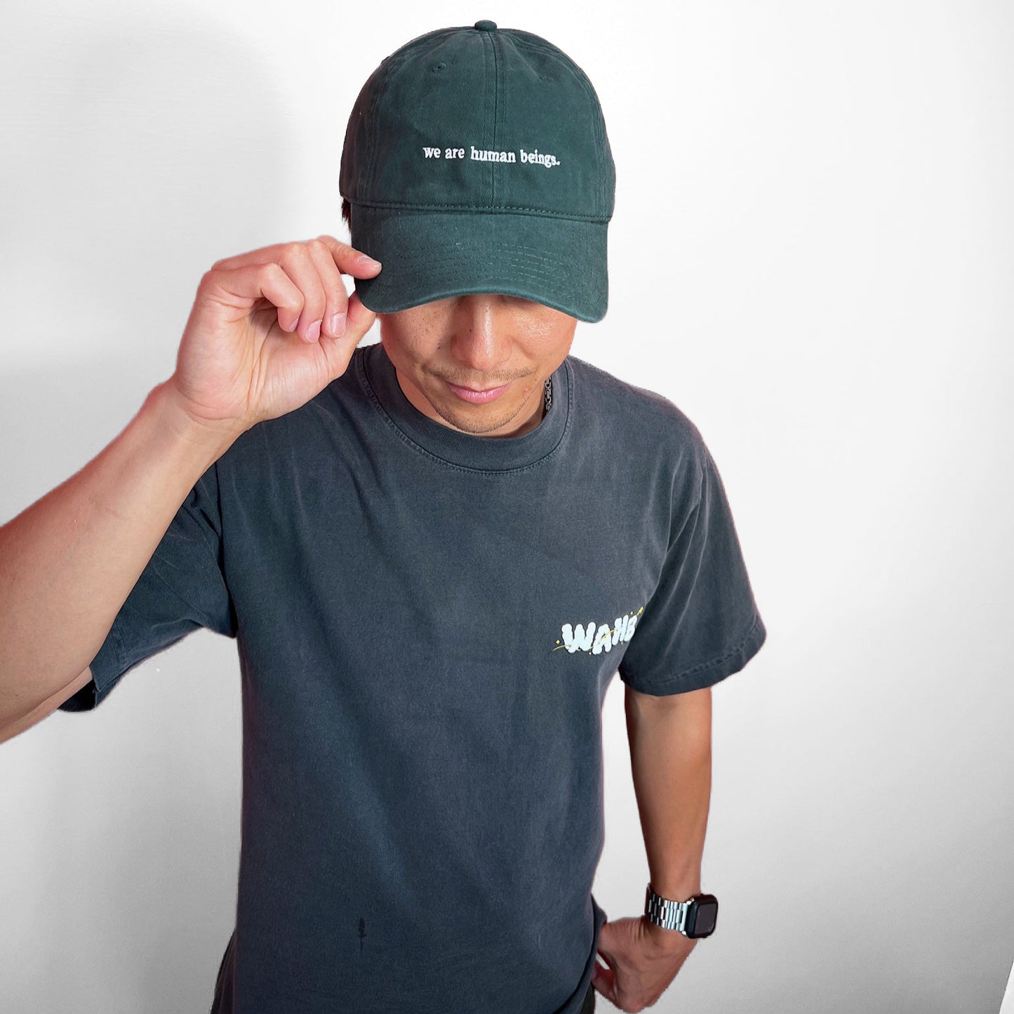 typewriter "we are human beings" hats (now available!)