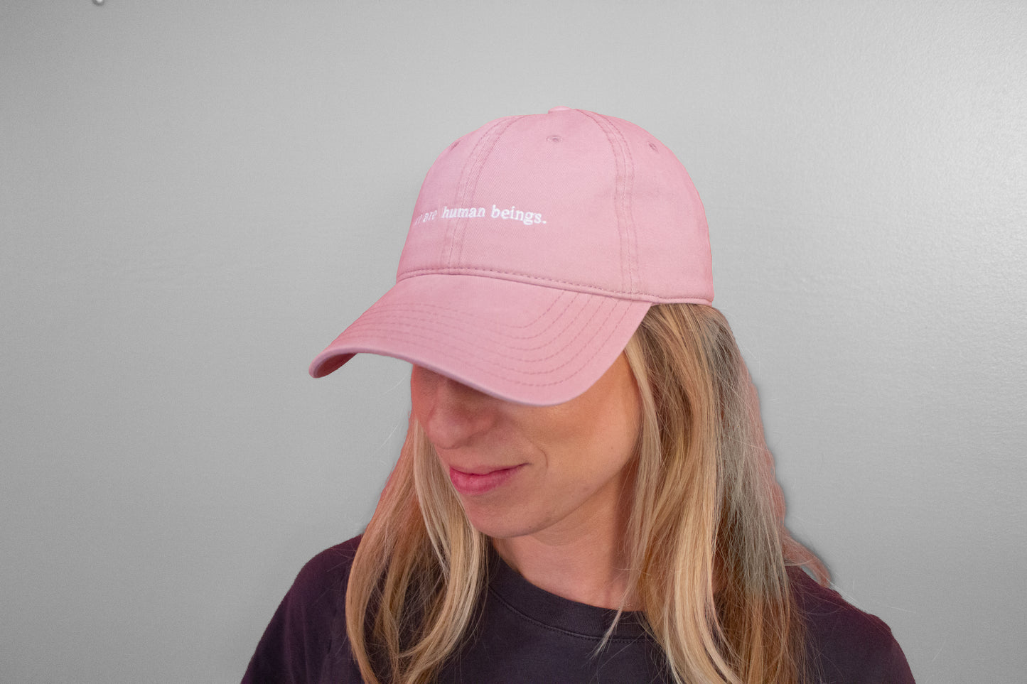 typewriter "we are human beings" hats (now available!)